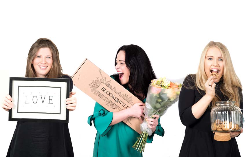 The Wedding Shop Gift Gurus holding wedding gifts